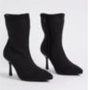 Torrid Size 10WW Black Stretch Knit Booties. New Without Tags. Never Worn.